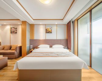 Qingdao Hanyuan Century Hotel - تشينغداو - غرفة نوم