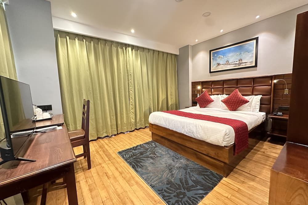 نومينوس هوتل - ثيمفو - غرفة نوم