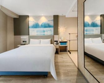 Wing Tin Hotel (Shenzhen Longgang Nanlian) - Shenzhen - Habitación