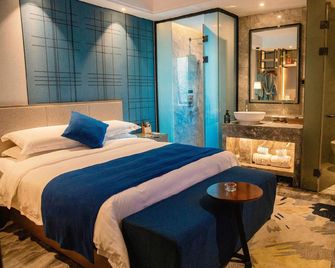 Angle Art Hotel - Bengbu - Спальня