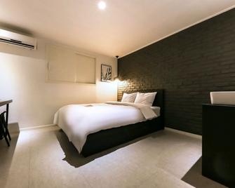 Hotel Yam - Daejeon - Schlafzimmer
