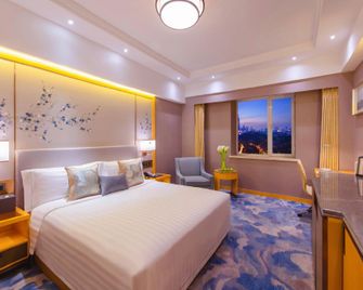 Jin-An Hotel Changchun - צ'נגצ'ון - חדר שינה