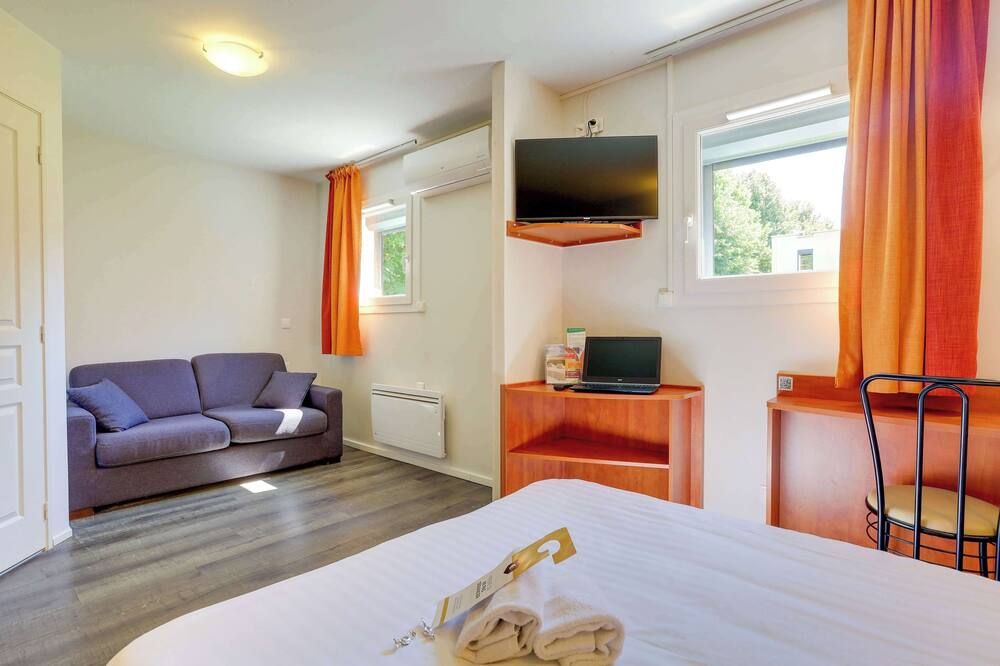 فندق بريت ريمس، لا بومبيل - رانس - غرفة نوم