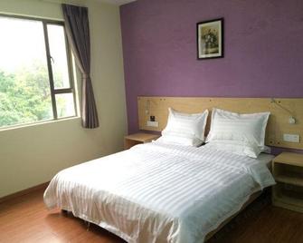 Rujia Business Hotel (Zhanjiang Aihua Plaza) - Zhanjiang - Ložnice