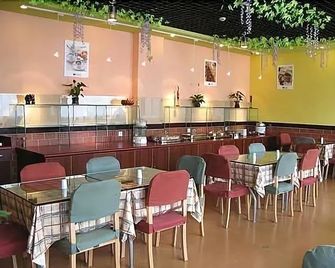 Home Inn Jinghong Xishuangbanna peacock Lake Civil Aviation - Xishuangbanna - Restaurant