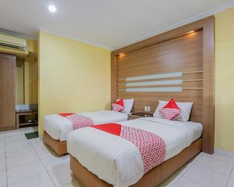 Hotel Senen Indah Syariah - Jakarta - Schlafzimmer