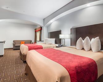 Scottish Inns & Suites - Spring - Ložnice