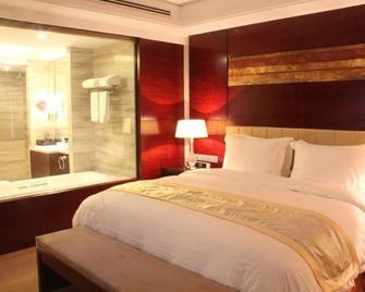Sun Plaza International Hotel - Jining - Bedroom