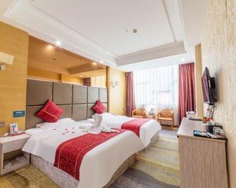 Yicheng Boutique Hotel - Guangyuan - Bedroom