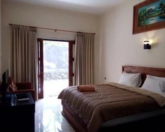 Family Garden Homestay - Senggigi - Habitación