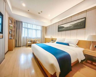 Soaring Dragon Tea Culture Hotel (Hanzhong High-speed Railway Station Wanbang Flagship) - Hanzhong - Habitación