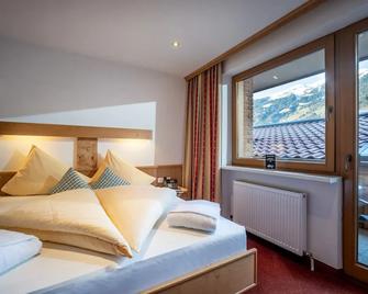 Alpenhof Hotel Garni Suprême - Zell am Ziller - Bedroom