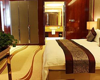 Panjin Swish Hotel - Panjin - Спальня
