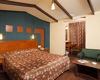 Hotel Jai - Kodaikanal - Soveværelse