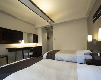 Hotel Binario Umeda - Ōsaka - Schlafzimmer