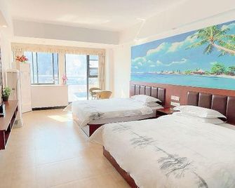 Aishang Yihao Apartment - Zhangjiajie - Makuuhuone