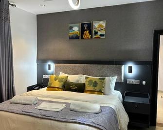 Macdestly Hotel - Port Harcourt - Camera da letto