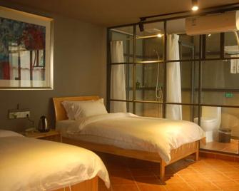 Lotus Bloom Youth Hostel - Guilin - Bedroom