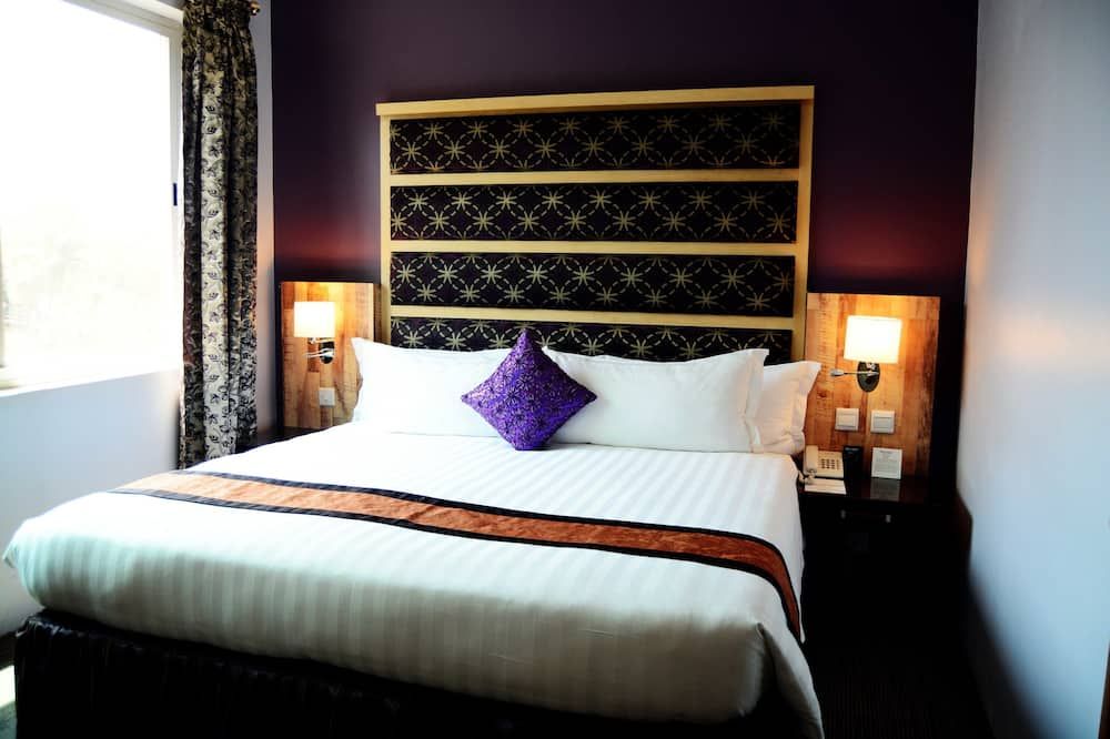 أركاديا سويتس - كامبالا - غرفة نوم