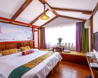 Bugu Hostel - Zhangjiajie - Habitación