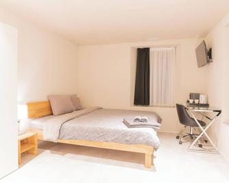 Hotel Rütli am Bahnhof Rüti ZH - Rüti - Bedroom