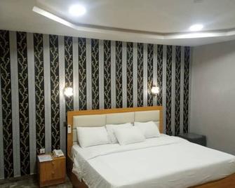 Camas Hotel & Suite Asero Abeokuta - Abeokuta - Habitación