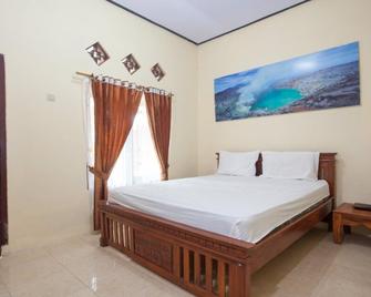 ijen resto & guest house - Banyuwangi - Bedroom