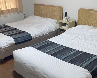 Sunhotel Miyakonojo - Miyakonojō - Camera da letto