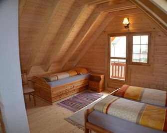 Log cabin in the Altmühltal Nature Park - Orchard - Adelschlag - Schlafzimmer