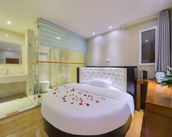 Super 8 Taizhou Jiangyan East Luotang Road - Taizhou - Спальня