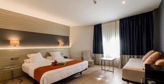 Hotel Avenida - A Coruña - Camera da letto