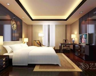 Vienna International Hotel Yangzhou Wanda Plaza Libao - Yangzhou - Спальня