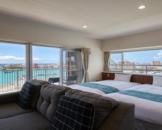 Seaside Condominium Rana Chatan - Chatan - Makuuhuone