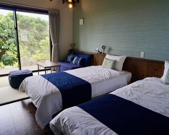 Sannin Resort - Motobu - Schlafzimmer