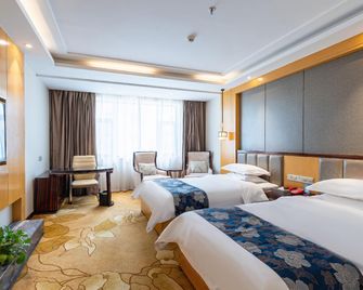 Huanghe Hotel(Gonghe Qinghai Lake Street Branch) - Hainan - Habitación