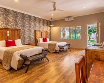 Little Pilgrims Boutique Hotel - Hazyview - Bedroom