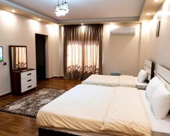 Grand Museum Pyramids Inn - Kairo - Schlafzimmer