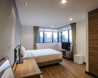 Novotel Living Singapore Orchard - Singapur - Schlafzimmer