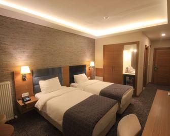 Garden Zara Hotel - Zara - Bedroom