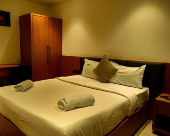 PK residency - Тируванантапурам - Спальня
