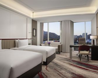 Movenpick by Accor Qingdao Sunmei - Qingdao - Bedroom