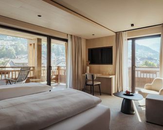 Hotel Cosmea 4 Stars - Your Dolomites Experience - Ортізеї - Спальня