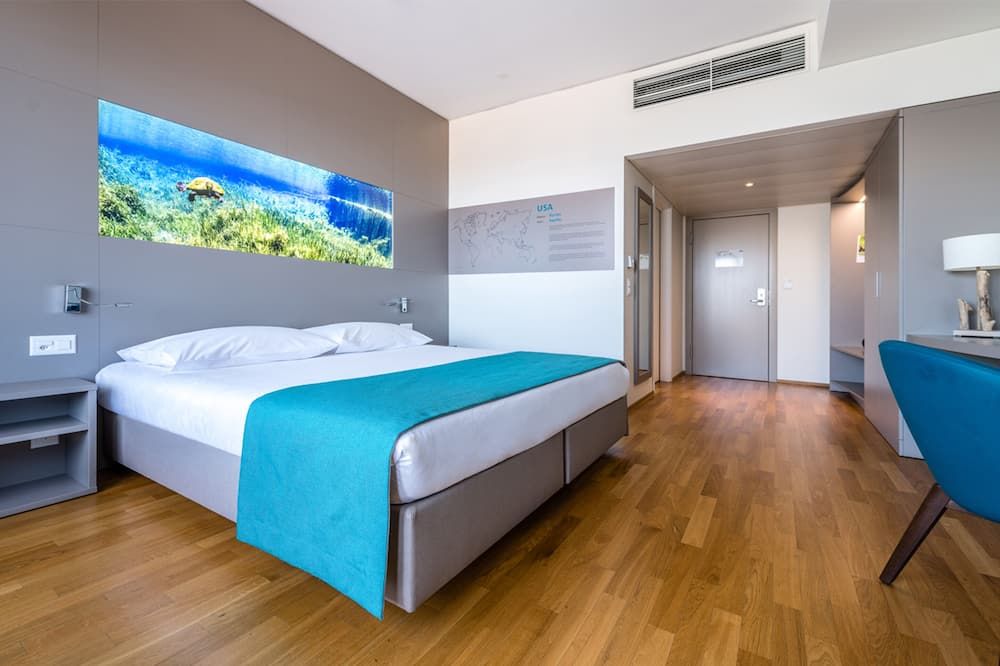 أكواتيس هوتل - لوزان - غرفة نوم