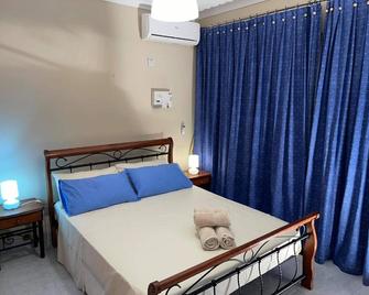 City Center Apartments - Mellea - Camera da letto
