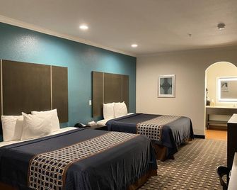 Regency Inn and Suites - יוסטון - חדר שינה