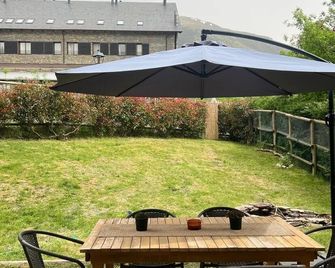 Ground floor apartment Aüt 1 with private garden in Vall de Boí - Caldes de Boí - Patio