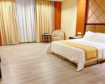 Yuelai Garden Hotel - دونغقوان - غرفة نوم