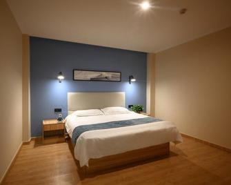 GreenTree Inn Henan Kaifeng Gulou Square Express hotel - Kaifeng - Bedroom