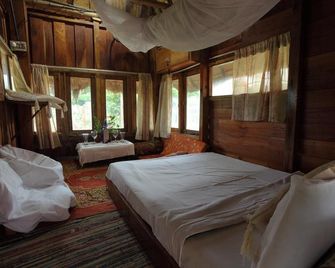 كوفي إن - ثيكادي - غرفة نوم