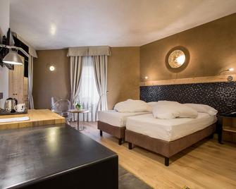 Hotel Orso Grigio - Cavalese - Makuuhuone